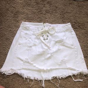 White ripped skirt with tie in the front